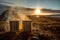 Two metal enamel cups of hot steaming tea by an outdoor campfire. Drinking warm beverage by a bonfire. Scenic Icelandic nature