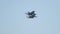 Two military fighter jets flying in the sky - fly nearby and then fly apart