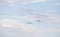 Two military long range bomber aircrafts flying in the cloudy sky
