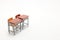 Two miniature school desks on white background.