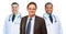 Two Mixed Race Doctors Behind Businessman Isolated on White