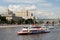Two modern pleasure boat sails along the Moscow River.