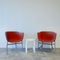 Two Modern red Chairs