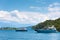 Two modern yachts in a picturesque sea Bay. The island and mountains