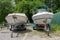 A two motor boats on trailers at parking
