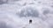 Two mountain climbers on an exposed ridge in the Swiss Alps