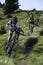 Two mountainbikers by downhill