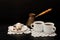 Two mugs of coffee, Turkish lokum with hazelnut, Cezve on a black background
