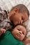 Two multiethnic boys brothers (focus on baby)