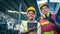 Two multiethnic industrial workers in the warehouse.