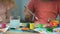 Two multiracial children painting with watercolors at workshop, creativity