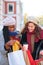 Two multiracial female friends looking the clothes they bought.