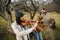 Two musicians playing in duet inside a beautiful leafless autumn forrest