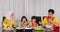 Two muslim parents and children having dinner