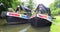 Two narrowboats moored up together