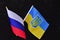 two national flags russian and ukrainian 2022 war concept