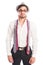 Two neckties hanging on male model wearing glasses and hat