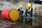 Two Officers of Environmental Engineering Wearing Protective Equipment with Gas Masks Inspected Oil Spill Contamination in