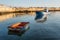 Two old boats in port - morning light