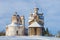 Two old churches in Paltoga, February day. Vologda region