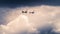 Two old planes cross a stormy sky during an exhibition during the Melun-Villaroche airshow