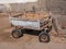 Two old rusty iron carts. The carts are weathered and old