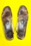 Two old, shabby inner dirty insoles of shoes. Worn out things