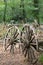 Two old wooden cartwheel against wood cart