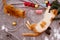 Two orange kittens on carpet in christmas holiday with decoration and ornament.