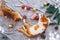 Two orange kittens on carpet in christmas holiday with decoration and ornament.