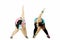 Two overweight women doing stretching on studio