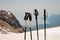 Two pair hiking sticks standing on the dirty snow on the Tahtali
