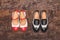 Two pairs of children`s shoes top view