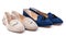 Two pairs of women suede shoes over white