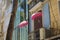 Two parasols on a balcony