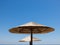 Two parasols made of straw