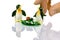 Two penguins ladybug and a master\'s hand ceremony