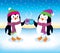 Two Penguins Toasting with Mugs of Hot Cocoa