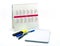 Two pens and a marker with a Notepad on a white background, Notepad and calendar 2021