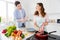 Two people dream harmony married couple enjoy hobby cooking girl fry raw organic meat pan communicate with husband hold
