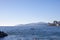 Two people enjoy a sunny day canoe ride out of Ambleside Beach