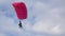 Two people flying Paraglider against clear blue sky. Paragliding Tandem. Extreme sport.