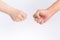 Two people guessing fist on a white background