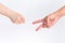 Two people guessing fist on a white background