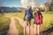 Two people walking on path in meadow field. Male and female traveler looking at attraction view point. Couples adventure at outdo