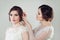 Two perfect women with makeup and bridal hair