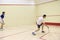 Two person playing squash