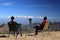 Two person sitting in front of mighty Himalaya on a holiday