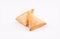 Two Piece golden samosa on white background