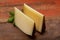 Two pieces of Manchego, queso manchego, cheese made in La Mancha region of Spain from the milk of sheep of the manchega breed